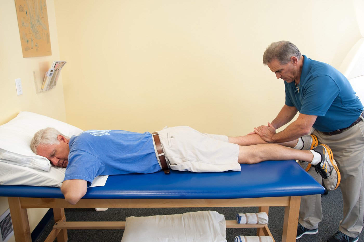 Delmarva Peninsula pre and post operative therapy therapist massaging patients calf